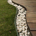 diy garden border with white marble pebbles 