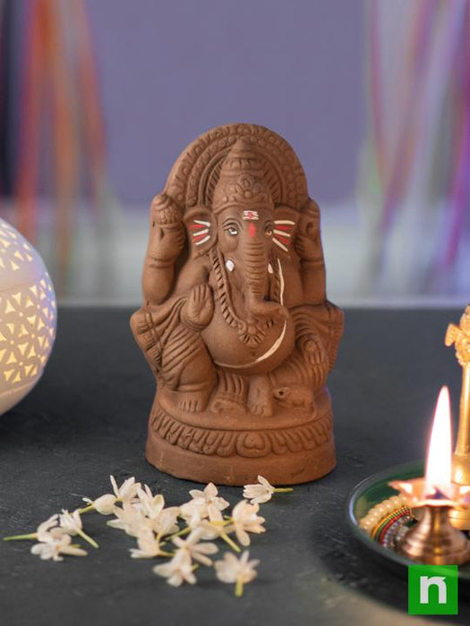 eco friendly clay ganesha with air purifier plants 